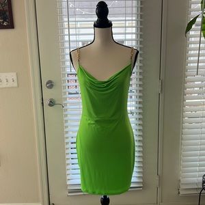 Lime green mini dress with gold chain straps. Size large. Never worn!